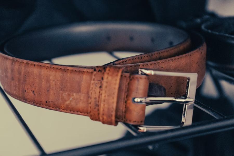 brown leather belt with holes